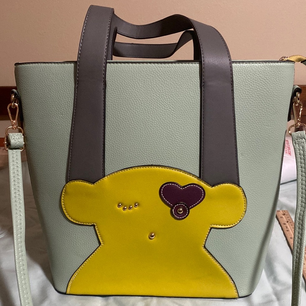 Unbranded convertible tote/crossbody bag.